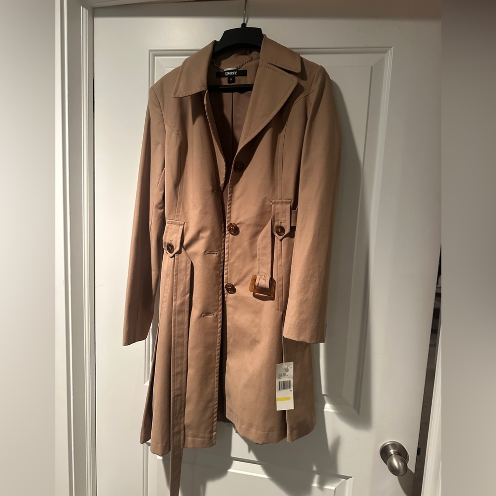 Trench coat DKNY brand new with tag still
attached size Medium
